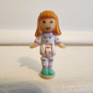 Adorable Doll Figure with Orange Hair and Blue Shoes